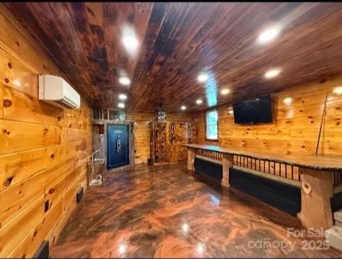 148 Barium Ln, Statesville, NC 28677 - game room featuring a wall unit AC, wooden walls, and wooden ceiling