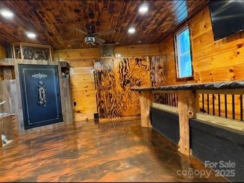148 Barium Ln, Statesville, NC 28677 - bar featuring a fireplace, wood walls, wood ceiling, recessed lighting, and wood finished floors