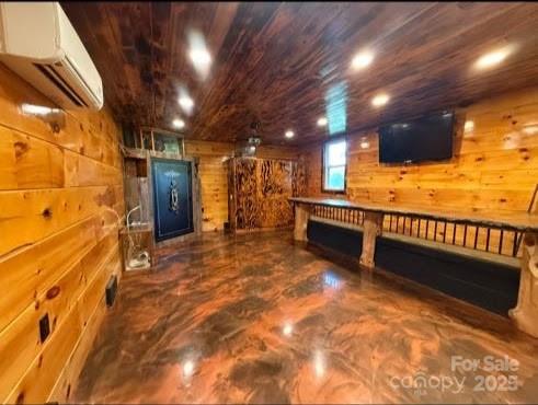 148 Barium Ln, Statesville, NC 28677 - recreation room with wooden walls, a wall mounted air conditioner, and wood ceiling