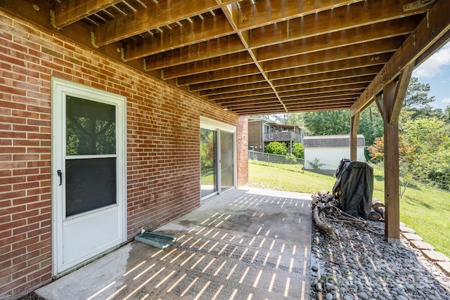 301 Rosemont Ave SE, Concord, NC 28025 - view of patio with a storage shed
