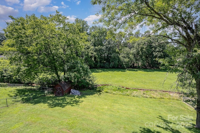 301 Rosemont Ave SE, Concord, NC 28025 - view of yard featuring a storage unit