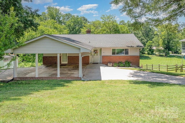 301 Rosemont Ave SE, Concord, NC 28025 - single story home featuring brick siding, a chimney, roof with shingles, and driveway