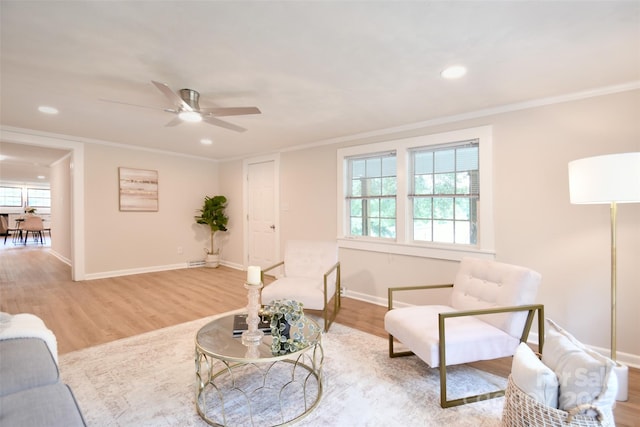 80 Sumner Ave NW, Concord, NC 28027 - living area featuring light wood-style floors, ceiling fan, healthy amount of natural light, ornamental molding, and recessed lighting