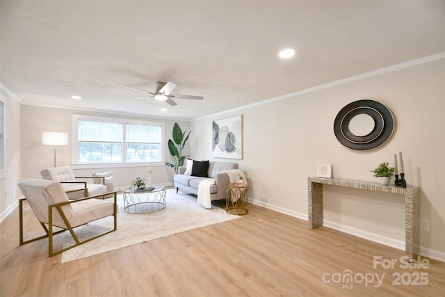 80 Sumner Ave NW, Concord, NC 28027 - living area with crown molding, wood finished floors, a ceiling fan, and recessed lighting