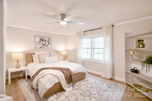 80 Sumner Ave NW, Concord, NC 28027 - bedroom with a textured ceiling, wood finished floors, ceiling fan, and crown molding
