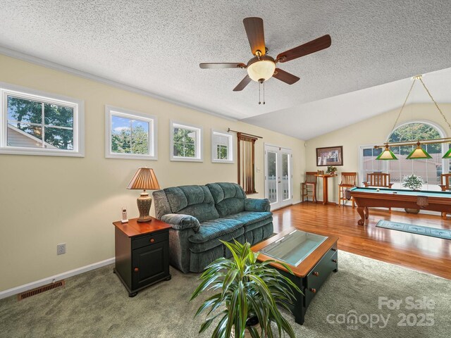 1302 Hawthorne Rd, Lancaster, SC 29720 - living area featuring ceiling fan, billiards table, a textured ceiling, lofted ceiling, and french doors