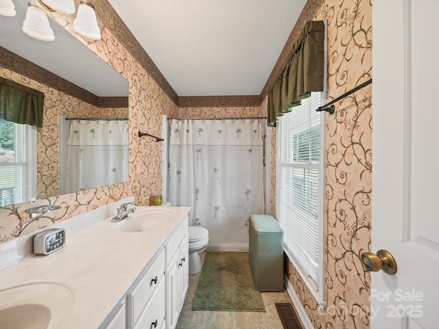 1302 Hawthorne Rd, Lancaster, SC 29720 - full bath with double vanity, wallpapered walls, curtained shower, and a textured ceiling