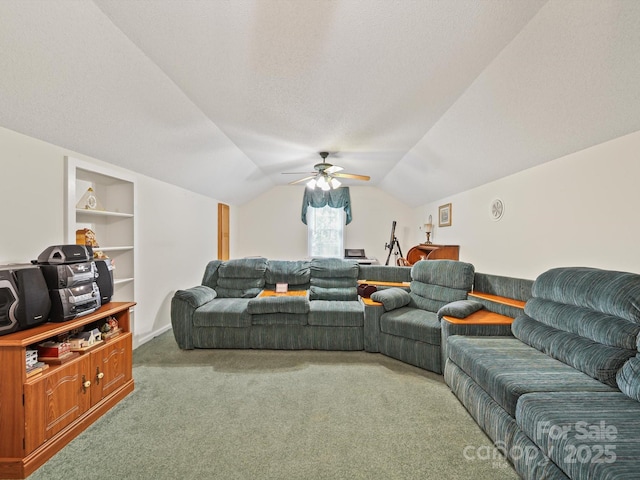 1302 Hawthorne Rd, Lancaster, SC 29720 - carpeted living area featuring a ceiling fan, lofted ceiling, and built in features