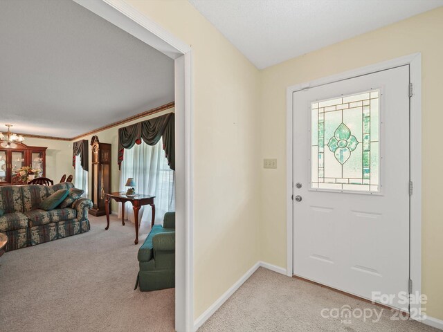 1302 Hawthorne Rd, Lancaster, SC 29720 - foyer featuring light carpet and a chandelier