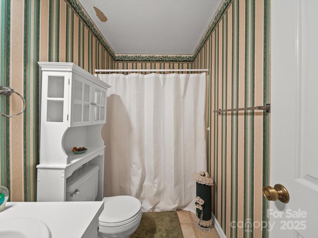 1302 Hawthorne Rd, Lancaster, SC 29720 - bathroom with wallpapered walls, a textured ceiling, vanity, tile patterned flooring, and curtained shower
