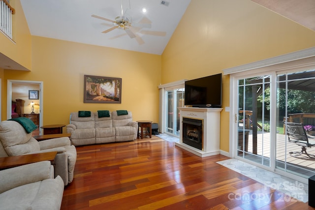 135 Primrose Dr, Salisbury, NC 28147 - living room with high vaulted ceiling, ceiling fan, wood finished floors, and a fireplace