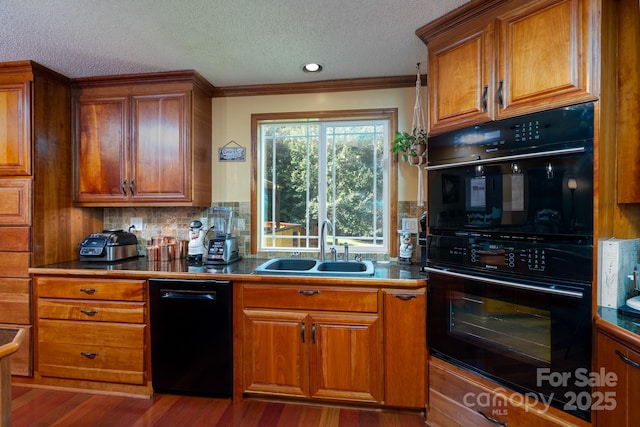 135 Primrose Dr, Salisbury, NC 28147 - kitchen with black appliances, brown cabinets, a textured ceiling, crown molding, and decorative backsplash