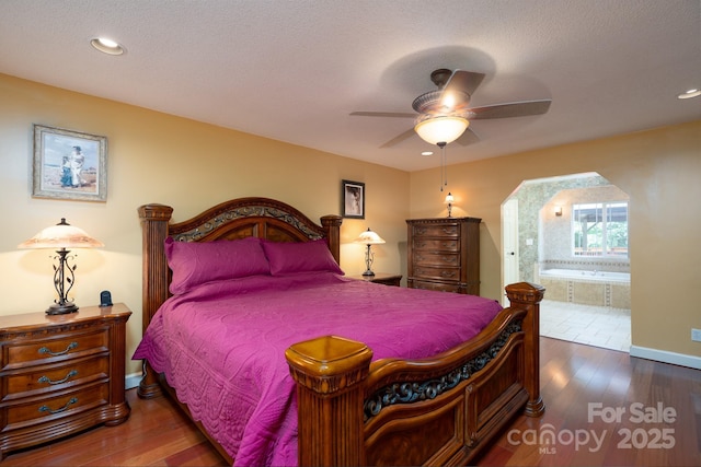 135 Primrose Dr, Salisbury, NC 28147 - bedroom with wood finished floors, ensuite bathroom, recessed lighting, and a ceiling fan