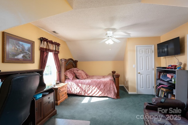 135 Primrose Dr, Salisbury, NC 28147 - bedroom featuring dark colored carpet, a textured ceiling, vaulted ceiling, ceiling fan, and a desk