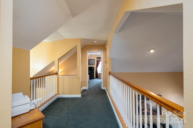 135 Primrose Dr, Salisbury, NC 28147 - corridor with carpet, vaulted ceiling, and a textured ceiling