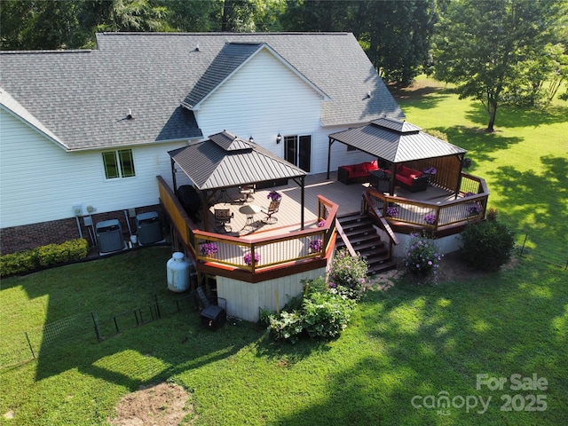 135 Primrose Dr, Salisbury, NC 28147 - back of house with a gazebo, a shingled roof, and a deck