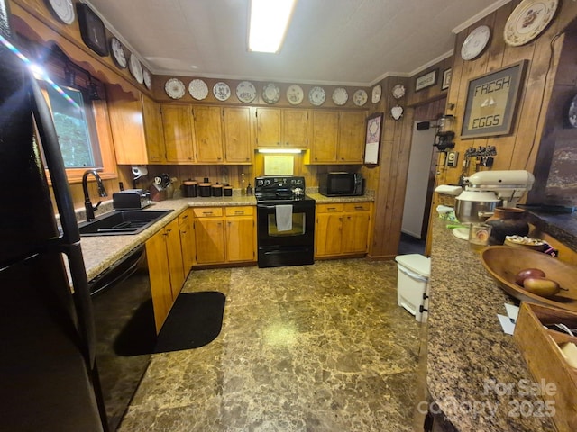217 Shortoff Ln, Highlands, NC 28741 - kitchen featuring black appliances, ornamental molding, and brown cabinets