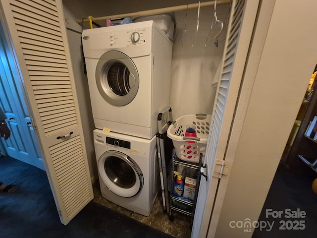 217 Shortoff Ln, Highlands, NC 28741 - laundry room featuring estacked washer and dryer