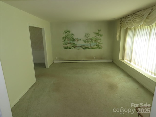 5823 Rupert Ln, Charlotte, NC 28215 - carpeted empty room with baseboard heating and baseboards