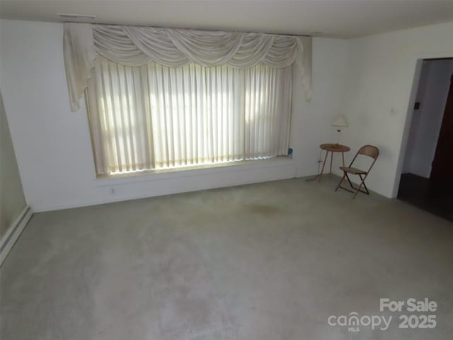 5823 Rupert Ln, Charlotte, NC 28215 - carpeted spare room with healthy amount of natural light