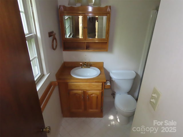 5823 Rupert Ln, Charlotte, NC 28215 - bathroom featuring tile patterned flooring and vanity