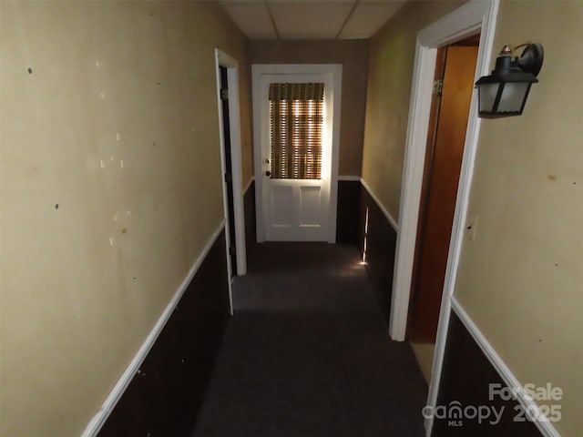 5823 Rupert Ln, Charlotte, NC 28215 - hall with dark carpet and a paneled ceiling