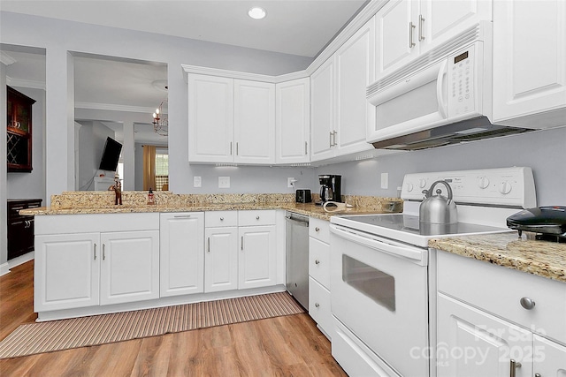 2044 Gable Way Ln, Matthews, NC 28104 - kitchen with white appliances, light wood-type flooring, white cabinets, recessed lighting, and light stone countertops