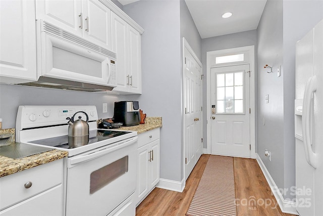 2044 Gable Way Ln, Matthews, NC 28104 - kitchen featuring white appliances, light wood-style flooring, white cabinetry, and light stone countertops