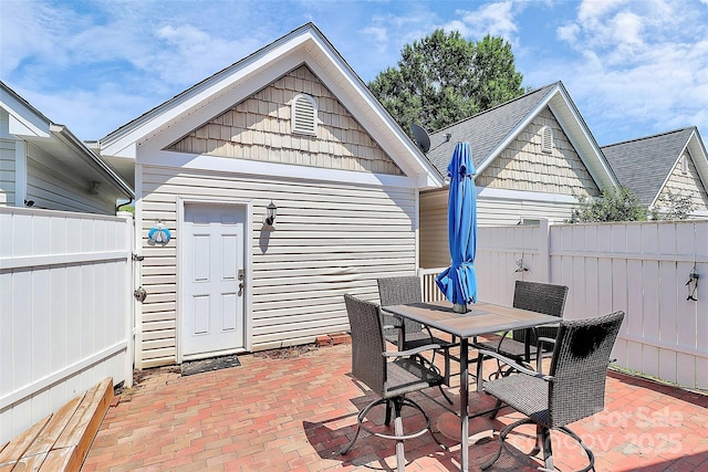 2044 Gable Way Ln, Matthews, NC 28104 - view of patio with outdoor dining area and a gate