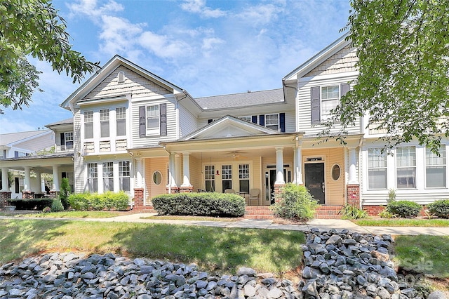 2044 Gable Way Ln, Matthews, NC 28104 - view of front of house featuring covered porch, brick siding, and a front yard