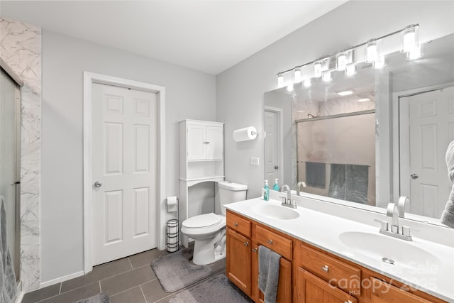 8618 Redding Glen Ave, Charlotte, NC 28216 - full bathroom featuring a marble finish shower, double vanity, and tile patterned floors