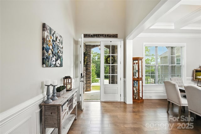 221 N Centurion Ln, Mount Holly, NC 28120 - entryway featuring healthy amount of natural light, crown molding, dark wood finished floors, wainscoting, and a decorative wall