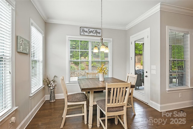 221 N Centurion Ln, Mount Holly, NC 28120 - dining room featuring a chandelier, dark wood-type flooring, and ornamental molding