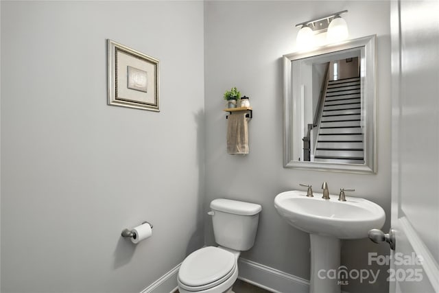 221 N Centurion Ln, Mount Holly, NC 28120 - bathroom with toilet and baseboards