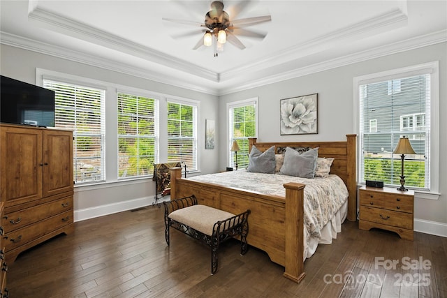 221 N Centurion Ln, Mount Holly, NC 28120 - bedroom with a raised ceiling, dark wood-type flooring, crown molding, and a ceiling fan