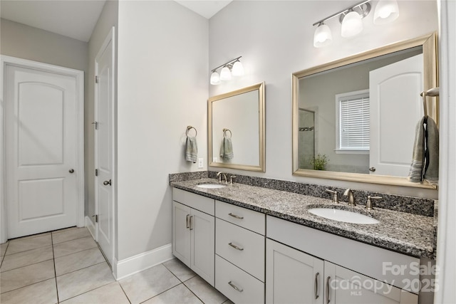 221 N Centurion Ln, Mount Holly, NC 28120 - full bath with double vanity, tile patterned flooring, and a shower