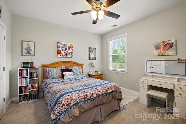 221 N Centurion Ln, Mount Holly, NC 28120 - bedroom featuring light colored carpet and a ceiling fan