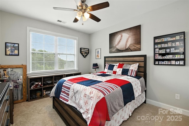 221 N Centurion Ln, Mount Holly, NC 28120 - carpeted bedroom featuring baseboards and ceiling fan