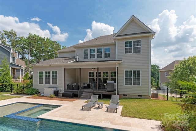 221 N Centurion Ln, Mount Holly, NC 28120 - rear view of house featuring a patio, a wooden deck, crawl space, an outdoor hangout area, and an in-ground hot tub