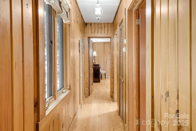 203 Laurel Ln, Little Switzerland, NC 28752 - hall featuring light wood-style floors and wood walls