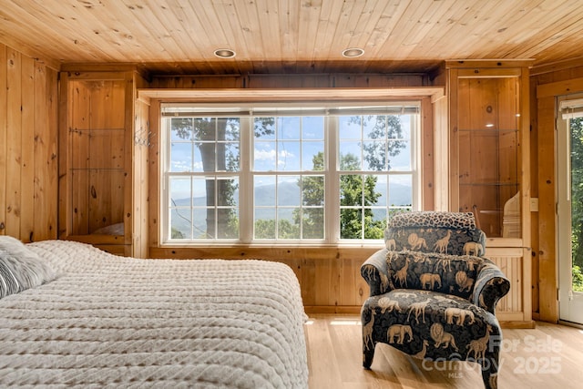 203 Laurel Ln, Little Switzerland, NC 28752 - bedroom featuring wood ceiling, wooden walls, and multiple windows