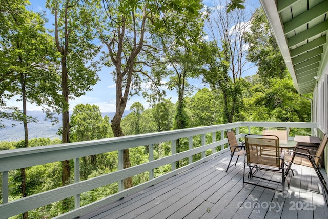 203 Laurel Ln, Little Switzerland, NC 28752 - wooden terrace featuring outdoor dining area