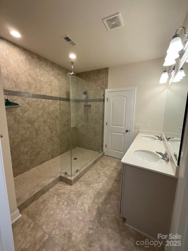 11608 Founders Park Ln, Pineville, NC 28134 - bathroom with a walk in shower, double vanity, tile patterned flooring, and recessed lighting