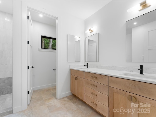 285 Poplar Crest Dr, Pisgah Forest, NC 28768 - bathroom featuring double vanity and a shower
