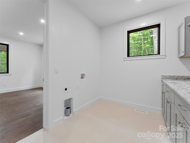 285 Poplar Crest Dr, Pisgah Forest, NC 28768 - laundry room with electric dryer hookup, cabinet space, hookup for a washing machine, recessed lighting, and wood finished floors