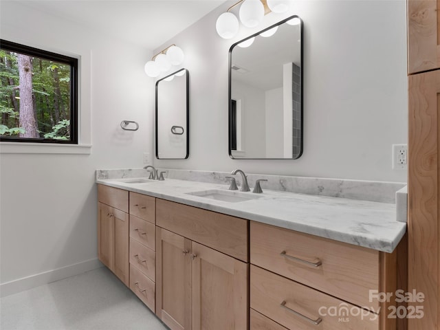 285 Poplar Crest Dr, Pisgah Forest, NC 28768 - bathroom featuring double vanity and baseboards