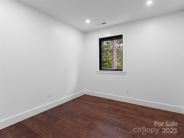 285 Poplar Crest Dr, Pisgah Forest, NC 28768 - spare room featuring dark wood-type flooring and recessed lighting