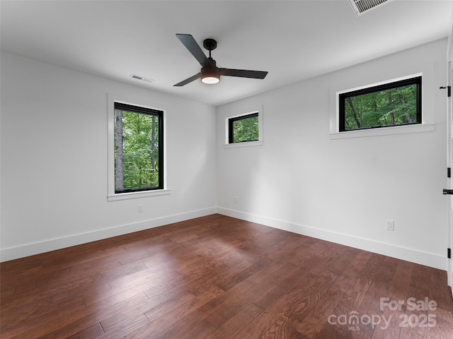 285 Poplar Crest Dr, Pisgah Forest, NC 28768 - spare room with a ceiling fan and dark wood finished floors