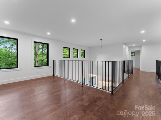 285 Poplar Crest Dr, Pisgah Forest, NC 28768 - spare room with healthy amount of natural light, wood finished floors, and recessed lighting