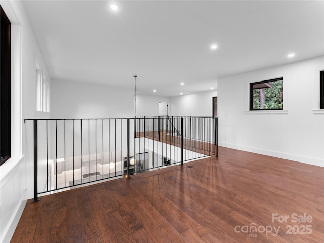 285 Poplar Crest Dr, Pisgah Forest, NC 28768 - unfurnished room with wood finished floors and recessed lighting